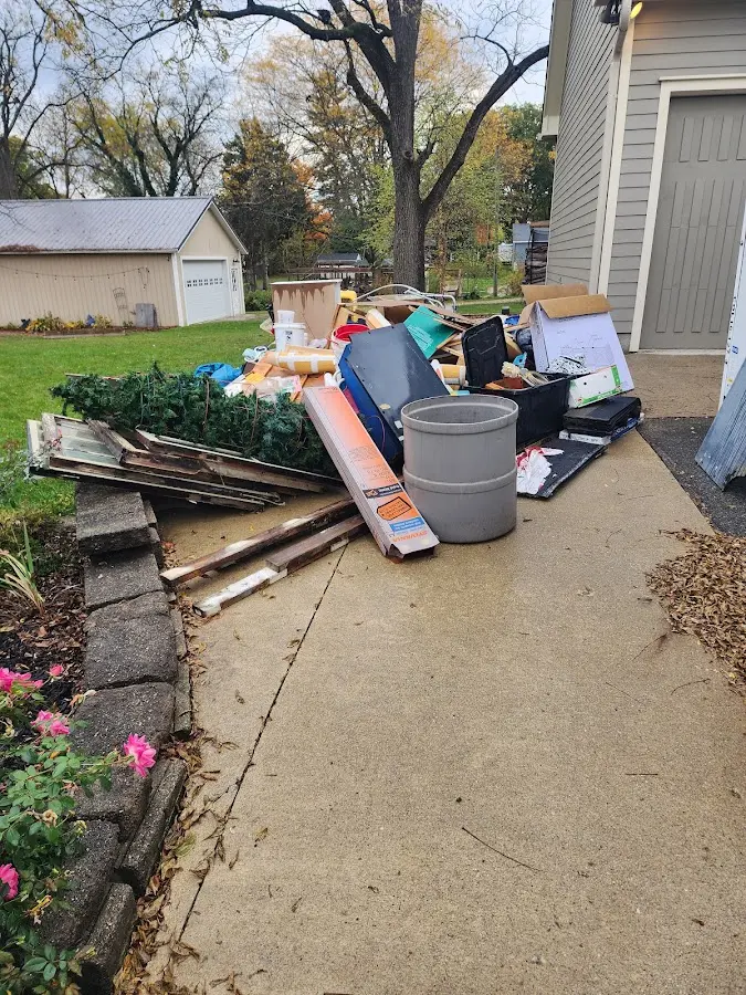 Dumpster being loaded with debris for Residential Dumpster Rental in Fishersville
